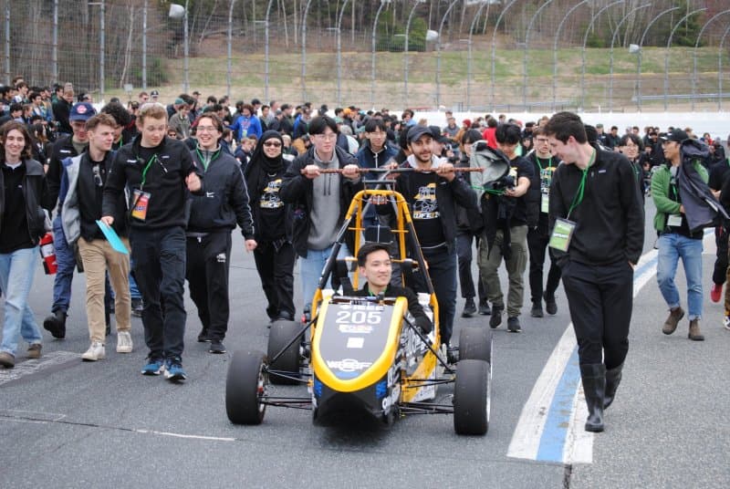 Here’s our team at a racetrack in Michigan with our latest electric car build.